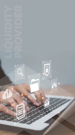 Two hands typing on a laptop, with a username & password being typed in.